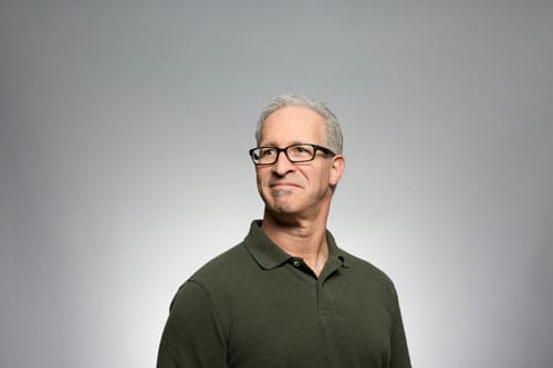 Caucasian Therapist learns benefits of video marketing