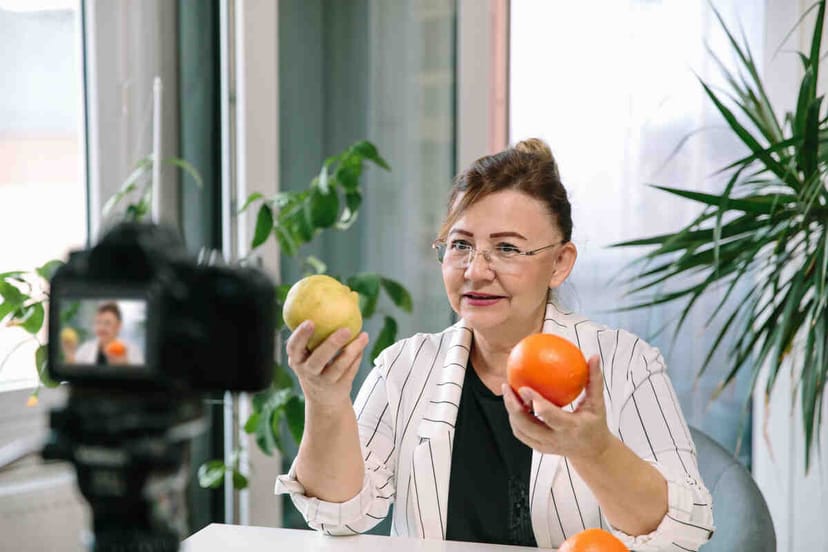 A therapist filming a video session, highlighting ethical marketing practices to attract clients and enhance SEO.