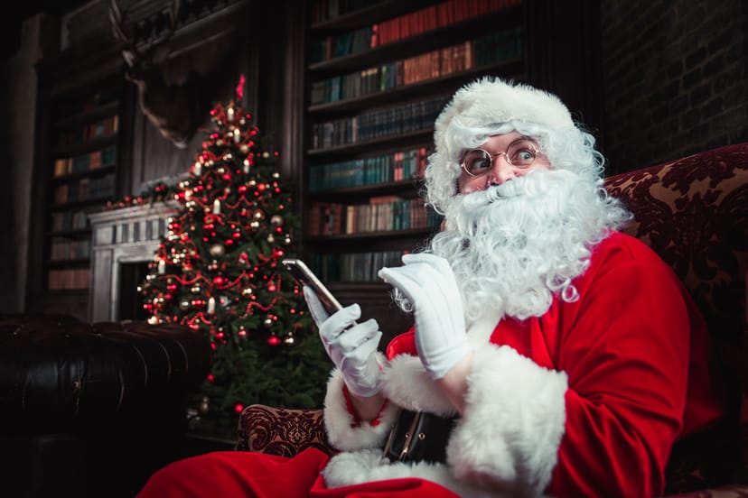 Therapist Santa utilizing video marketing strategies to connect with clients during the holiday season