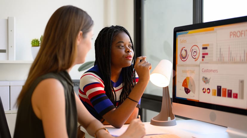 Therapist reviewing video marketing metrics to enhance client engagement and growth strategies.